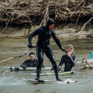 Surfing-in-the-river-with-a-bungee-rope-and-foil-board